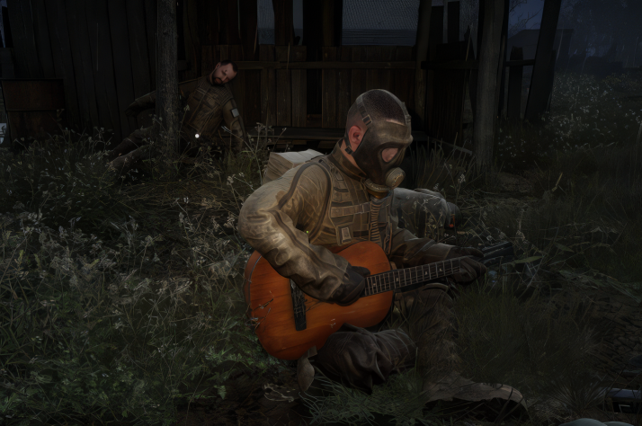 Сталкер решил сыграть последнюю песню павшему товарищу.