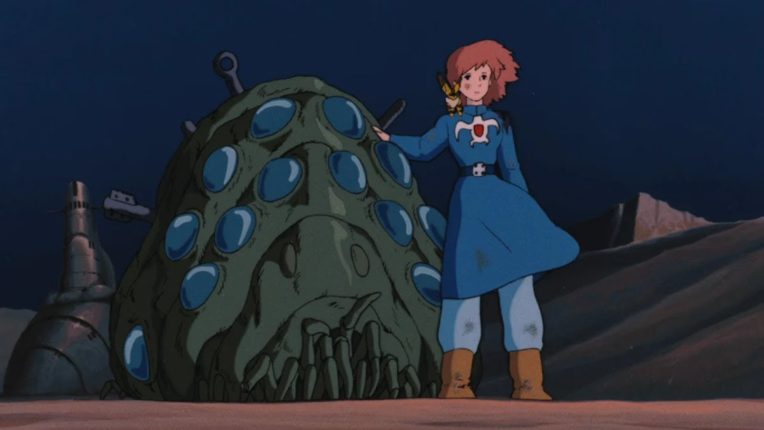 Навсикая стоит на пути мчащейся волны жуков, надеясь предотвратить уничтожение Долины Ветров