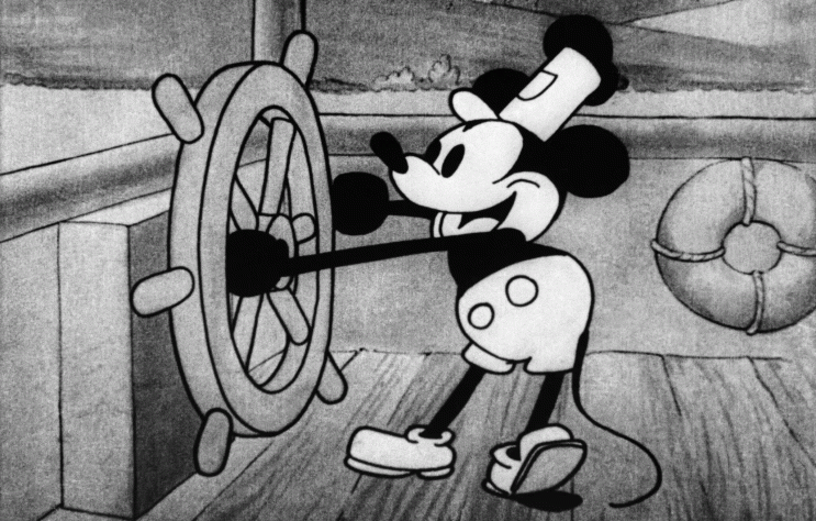 Вот так Микки Маус выглядит в «Пароходике Вилли» 1928-го. Этот образ ушёл в общественное достояние и использовать его теперь можно…